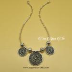 Collier mobile en argent, composé de 3 disques avec ornementation style berbère